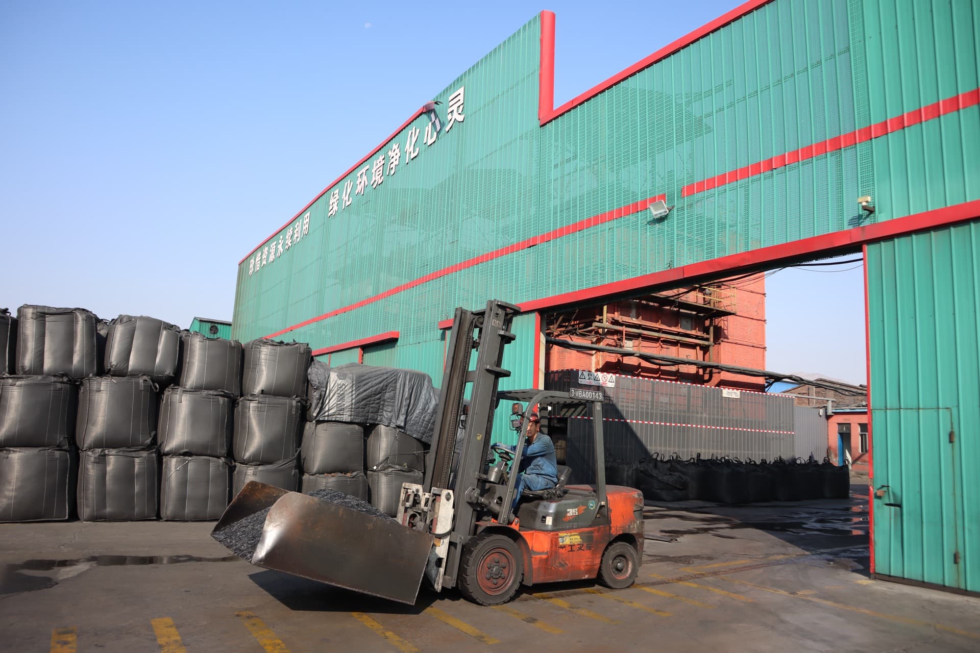 Forklift loading activated carbon bags